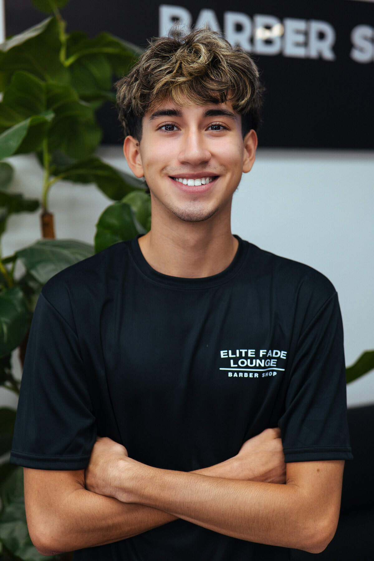 Alejo, barber at Elite Fade Lounge